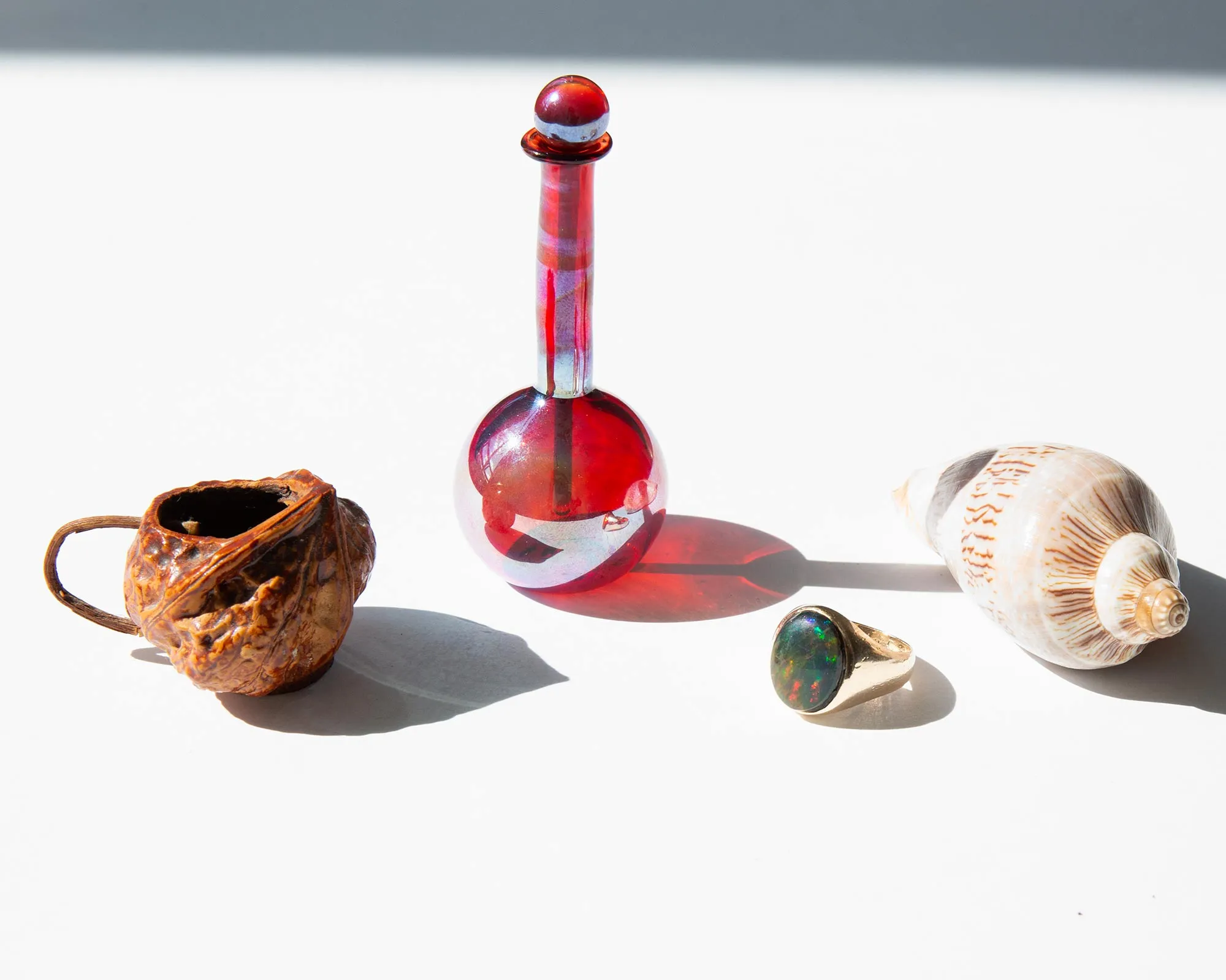 Carved Walnut Shell Pitcher