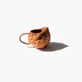 Carved Walnut Shell Pitcher
