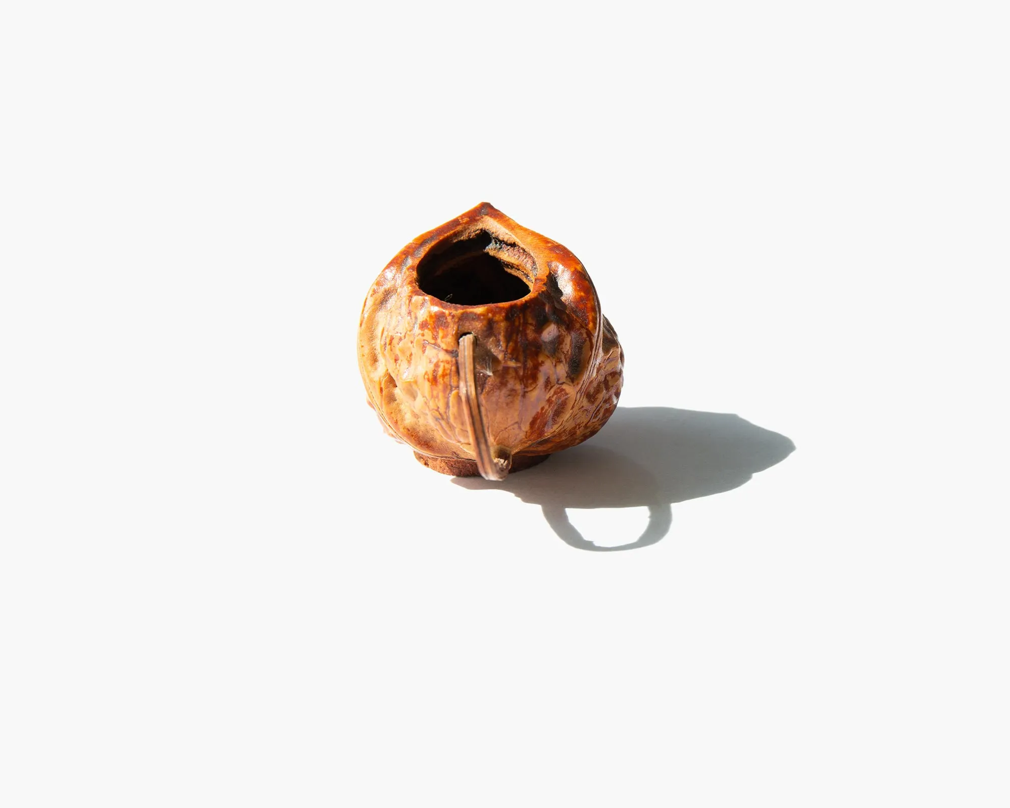 Carved Walnut Shell Pitcher